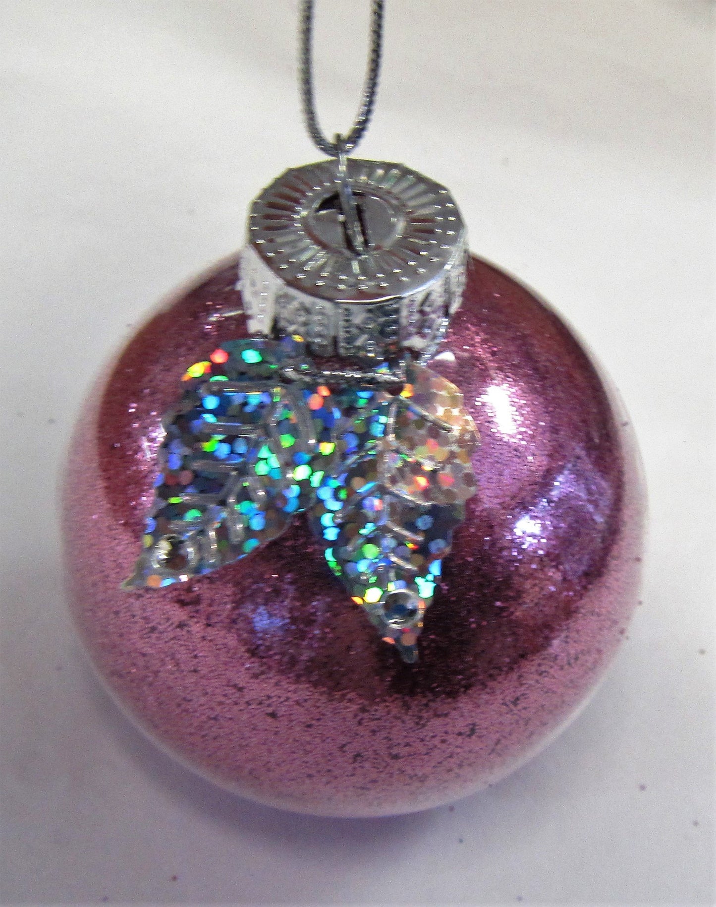 Various beautiful handcrafted glitter bauble Christmas tree decorations