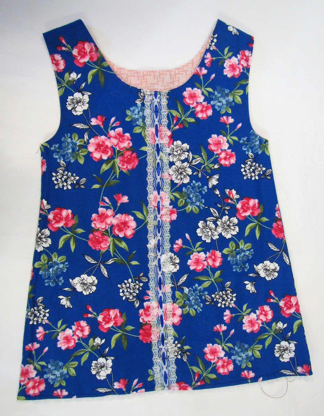 Hand crafted blue and pink floral pinafore 9-12 months