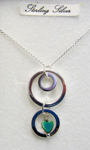 Handcrafted 925 sterling silver circle pendant with haematite heart necklace