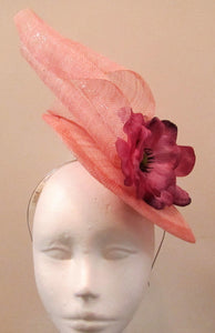 Handcrafted light pink disk with waves and purple flowers fascinator on a hair band