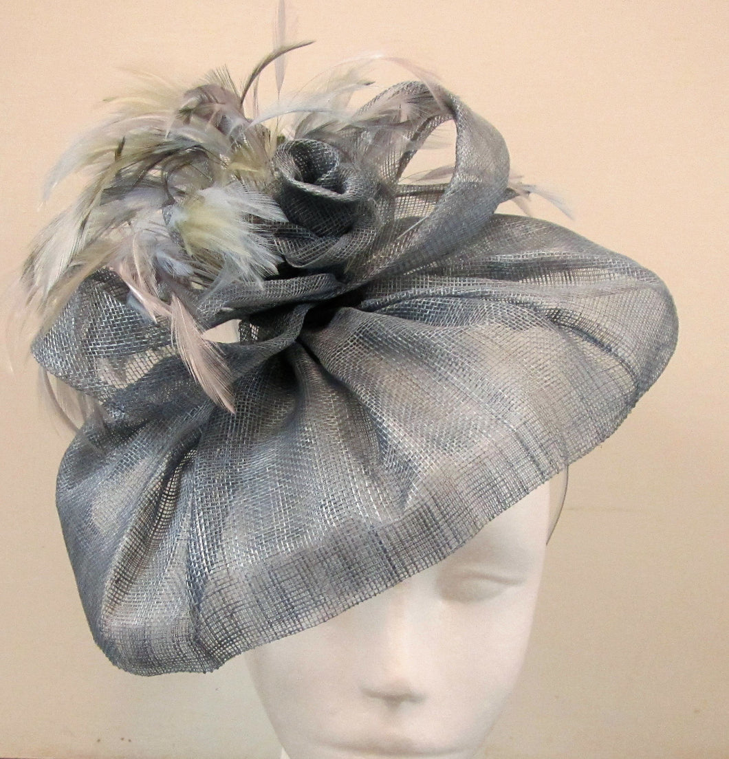 Handcrafted air force blue  fascinator with bow rose and feathers on a hair band