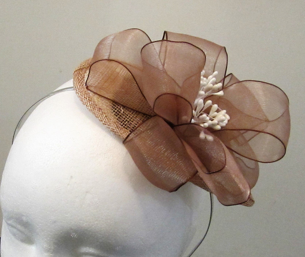 Handcrafted small beige bow  fascinator  on a hair band