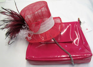 Handcrafted fuchsia pink top hat fascinator with feathers on a hair band