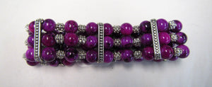 Purple and silver beaded elasticated handcrafted bracelet