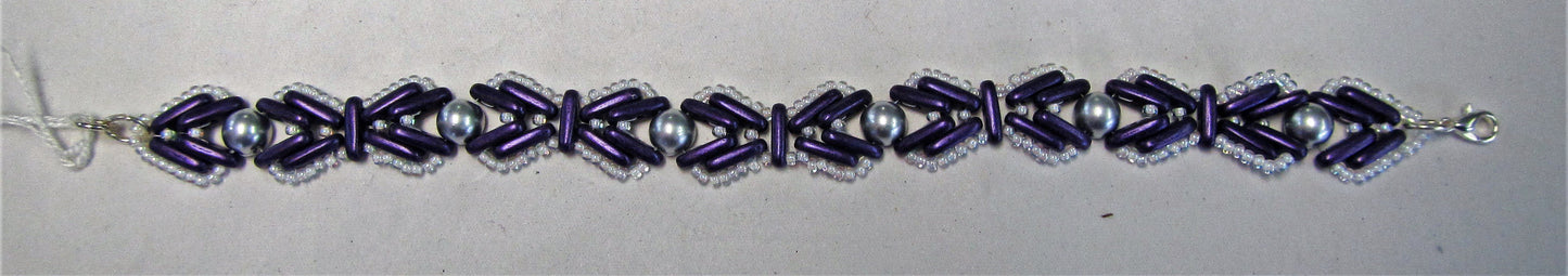 Purple white and silver beaded handcrafted bracelet