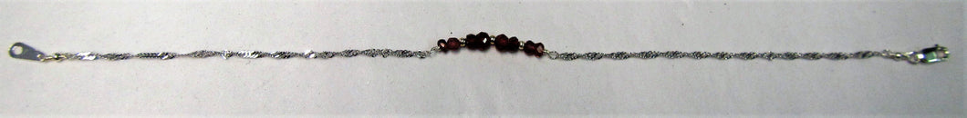 Handcrafted sterling silver bracelets with precious stones