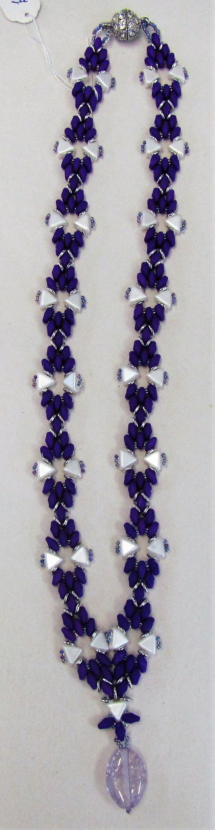 Handcrafted purple cord and white beaded necklace