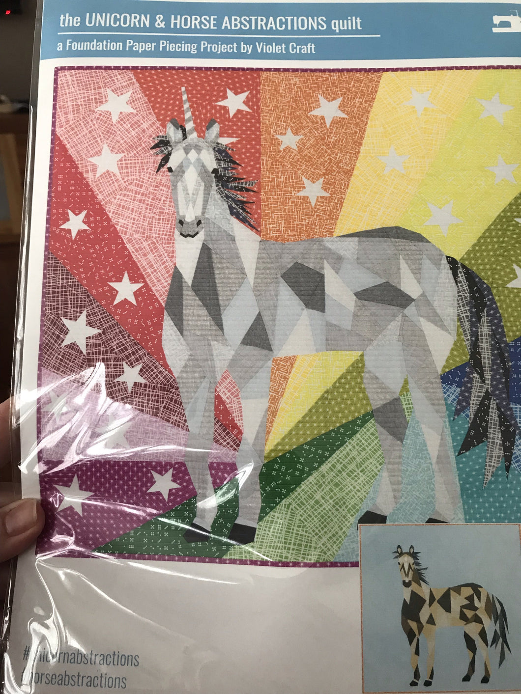 The Unicorn & Horse Abstraction quilt byViolet Craft